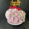 Fresh flowers in a slice of flower cake 