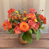 Bring the beauty of fall into your home with this stunning flower