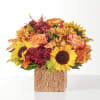 Embrace the season with this autumn blend of sunflowers, orange roses and