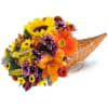 Beautiful fall flowers arranged in a festive cornucopia