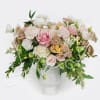 Delicate and dreamy!  Soft pinks, creamy whites, and fresh greenery come