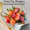Our design team will select the freshest seasonal assortment or tropical orchid