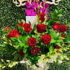 Grand and Gorgeous! Designed with fresh roses, orchids, luxe greens and upgraded