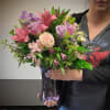 This delightful arrangement features elegant pink Lilies, romantic lavender Roses, delicate pink