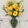 Bring warmth, joy, and elegance into any space with radiant arrangements that