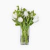 Tulip Grace: Elegant white tulips with fresh greenery, a timeless design bringing
