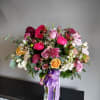 A beautifully selected bunch of the freshest flowers in a vase uniquely