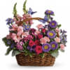 Talk about a bountiful basket! This wicker basket is overflowing with beauty
