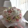 A soft and tender bouquet that feels like a warm hug at