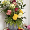 Between 8- 12 roses, 2 snapdragon, carnations and fillers