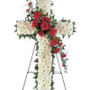 This striking red and white cross honors your loved one in a