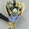 Half dozen wrapped in paper with mixture of filler flower . 