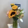 A composition where light meets elegance.
Golden sunflowers, delicate white tulips, and soft