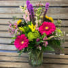 Large cylinder vase filled with our designer&rsquo;s choice of the freshest flowers