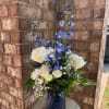 Elegant whites and royal blues come together in a cobalt vase. An