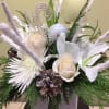 Christmas Greens with Casa Blanca Lilly&#039;s and White Roses with Pine Cones