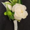 Spray roses make up this boutonniere. In the special instructions tell us