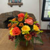 Celebrate the richness of autumn with this  bouquet, artfully arranged in