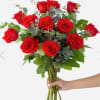 We arrange and design 12 red roses with greenery and baby&#039;s breath