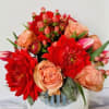 beautiful vase with a spring flowers: tulips, roses, dahlia