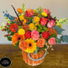 A beautiful, large, and unique autumn arrangement. Made with orange, yellow, peaches
