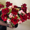 French red roses paired with delicate pink mini roses in a sleek