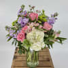 This enchanting bouquet features an exquisite combination of pink roses, white hydrangeas