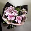French lavender roses with fresh greenery, wrapped in soft tissue and sleek