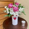 Sweetie too features 3 pinky/purple roses with other designer selected beauties in