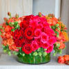 A celebration of bold beauty and fiery elegance, this luxurious arrangement showcases