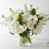 Indulge in the delicate beauty of the &quot;Vanilla Blossom&quot; arrangement, a luxurious