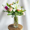 This bouquet features Lillies and Roses. The colors are perfect to share