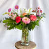 This bouquet features Lillies and Roses. The colors are perfect to share