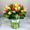 36 luscious tulips elegantly arranged in a keepsake cylinder glass vase! A