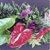 Diverse foligage woven with floral bloom accents create a visual delight.&nbsp;&nbsp;The perfect