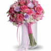 This petite pink and lavender bouquet was made by magical fairies especially