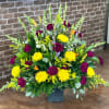 Purple, white orange and yellow mix for sympathy