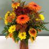 Florist designed bouquet. Your designer will select an assortment of fresh fall