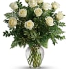 Elevate the art of romance and elegance with our exquisite arrangement of