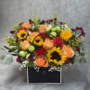 Introducing our design Surprise Me! Beautifully arranged with sunflowers, roses , delphiniums