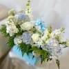 Theme Colors: Shades of white, blue and green 

Featured Blooms: Roses, Hydrangeas