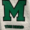 White Scalloped Edge Throw with Green &quot; M &quot; THE HERD Letters.