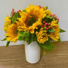Bright, cheerful, and full of sunshine, this arrangement features seven radiant sunflowers