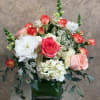 Send someone special this beautiful coral and peach arrangement. 
Type of Flowers: