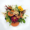 A Pumpkin Fall Arrangement with a real pumpkin for the container! 