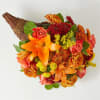 Embrace the spirit of Thanksgiving with a centerpiece that&#039;s bursting with bountiful