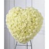 Create a tender and loving tribute with our closed heart standing spray