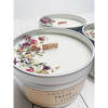 Hand poured 8 oz tin candles filled with 6 oz. of soy