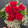 This all red rose mini dance bouquet perfect for any day.