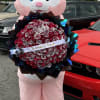 100 Buchon red roses with glitter &amp; ribbon (specify).